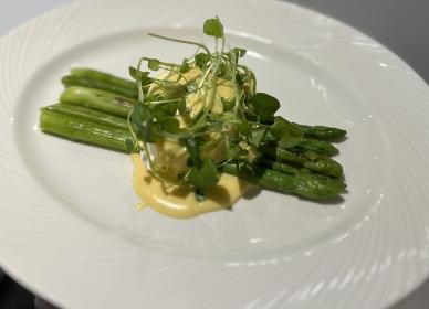 Grilled asparagus & poached egg served with hollandaise sauce